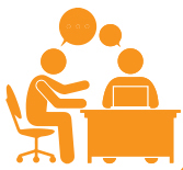 Coaching services icon - two people sitting at a table with a laptop